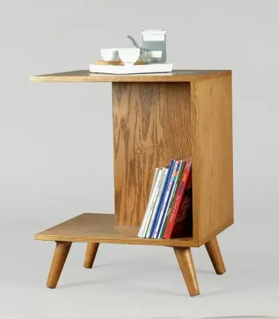 brown wooden table with books and mugs