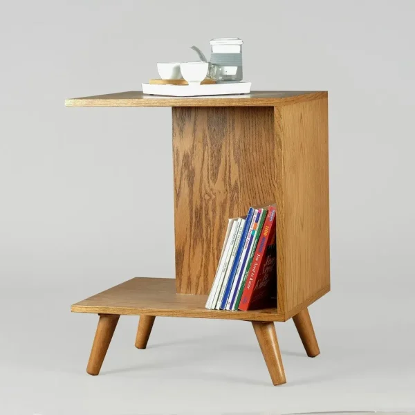 brown wooden table with books and mugs