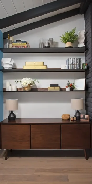 a living room with a book shelf filled with books